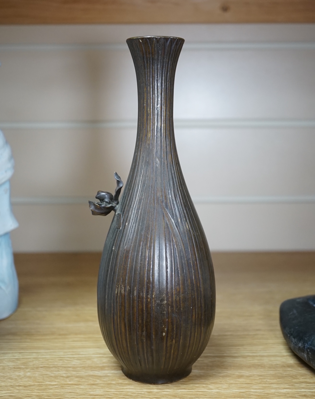 A Japanese bronze 'Iris’ vase, 24cm high. Condition - some marks to body of vase